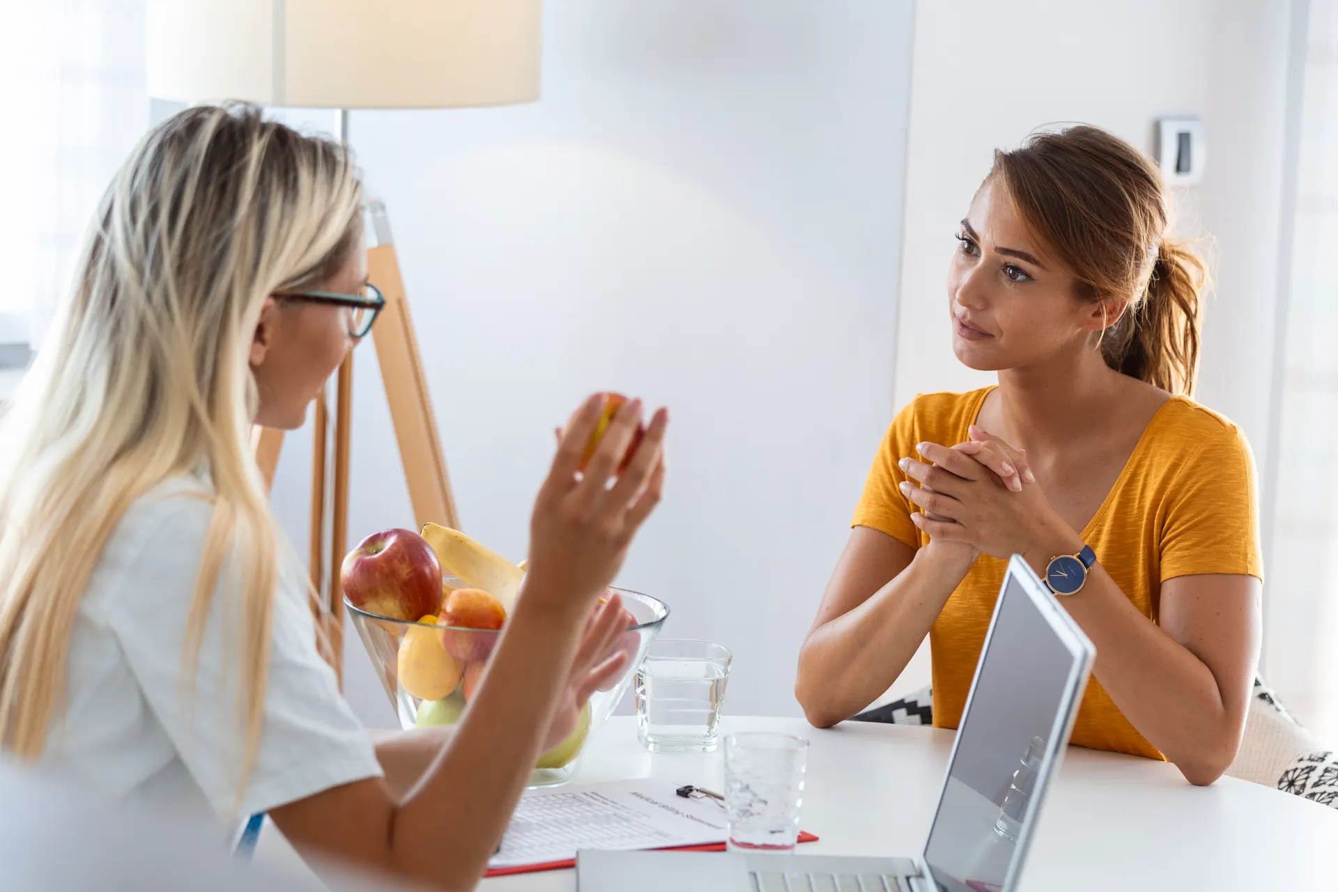 Wellness consultant reviewing an employee ergonomics dashboard