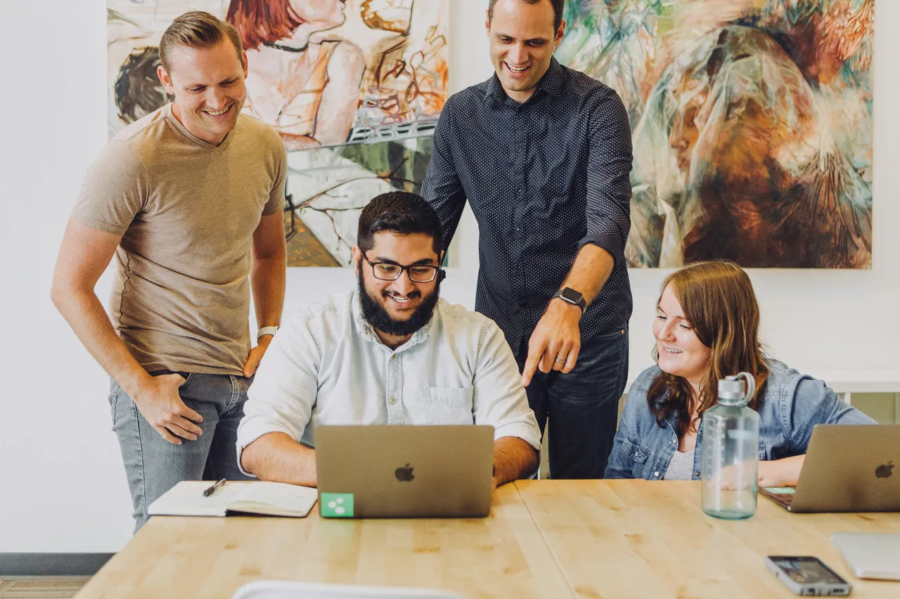 BalanceFlo founders at their desks